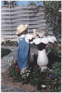 girl at birdbath